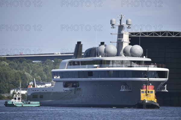 The new superyacht COSMOS leaves the Lürssen shipyard near Rendsburg for the Kiel Canal, Kielkanal, Kiel Canal, Schleswig-Holstein, Germany