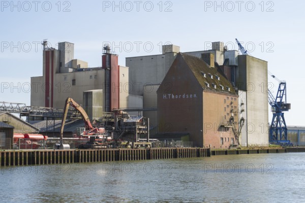 Grain silos, warehouses, land trade, outer harbour, Husum, North Frisia, North Sea, Schleswig-Holstein, Germany
