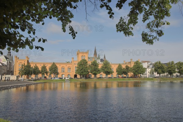Pfaffenteich with arsenal, church tower of St Paul's Church, shore, lake, Schwerin, Mecklenburg-Western Pomerania, Germany