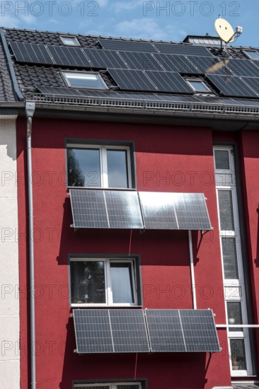 Residential building with photovoltaic modules on the façade and roof, North Rhine-Westphalia, Germany