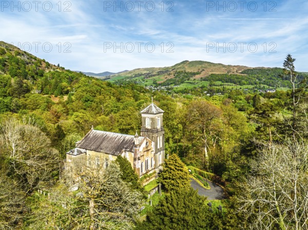 Holy Trinity Church from a drone, Bog Lane, Brathay village, Lake District, Cumbria, England, United Kingdom