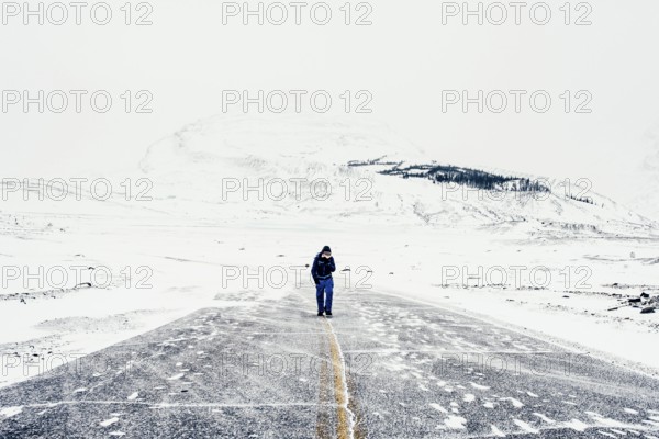 Winter road trip on the Icefields Parkway with lots of snow and ice, Banff National Park, Jasper National Park, Alberta, Canada
