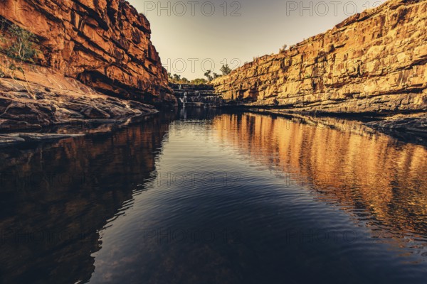 Bell Gorge waterfall, a body of water in north-west Australia in the Kimberley. Sunrise in the outback, Australia