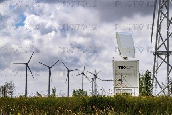 Wind farm in Eemshaven, radar system of the Dutch manufacturer Robin, bird radar, here type Robin Max Radar, detects birds and flocks of birds up to 15 km away in order to switch off wind turbines if necessary to avoid collisions and minimise damage, Netherlands