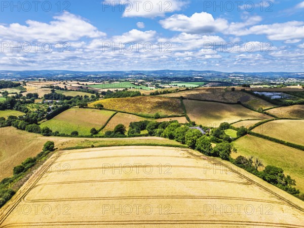 DefaultFarms and Fields over Torquay from a drone, Devon, England, United Kingdom