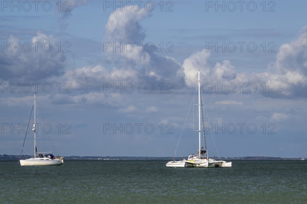 Boats on sea over Knoll Beach Studland, Poole, Dorset, England, United Kingdom