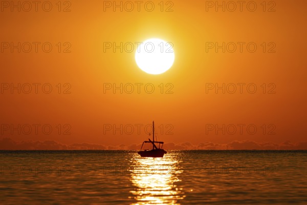 The sun rises on the Costa Rei, a stretch of coastline on the Italian Mediterranean island of Sardinia, Monte Nai, Costa Rei, Sardinia, Italy