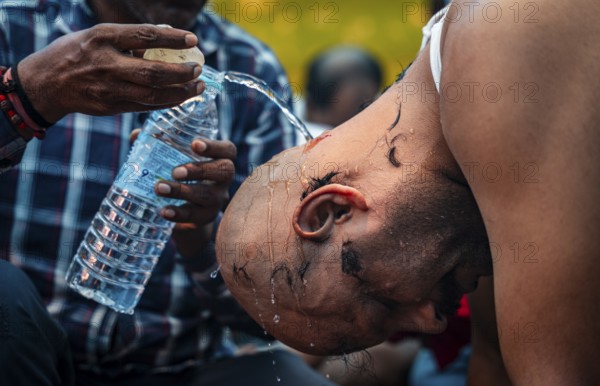 Drivers affiliated with Ola, Uber, and Rapido, under the banner of the Assam State Drivers' Union and the All Assam Cab Welfare Federation, shaved their heads in protest in Guwahati, India, on July 22, 2025. The demonstration held to highlight their demands for fair fare rates, regulation of aggregator commissions, and access to social security and welfare benefits