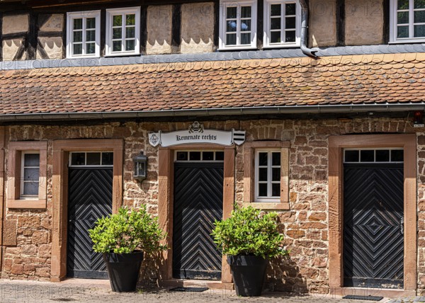 The old castle with Barbarossaplatz and the castle café in the old town centre of Büdingen, Hesse, Germany