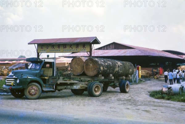 Timber lorry at East Johore Sawmills, Johor Bahru, Malaysia, Southeast Asia c 1963