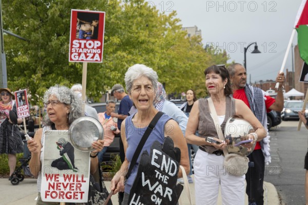 Detroit, Michigan USA - 26 July 2025 - Protesters rally at Eastern Market, banging empty pots to protest starvation in Gaza