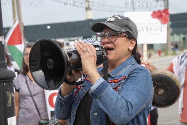 Detroit, Michigan USA - 26 July 2025 - Protesters rally at Eastern Market, banging empty pots to protest starvation in Gaza. Rashida Tlaib. the only Palestinian-American member of Congress, was near tears as she spoke about the hunger in Gaza. Tlaib has family in the West Bank