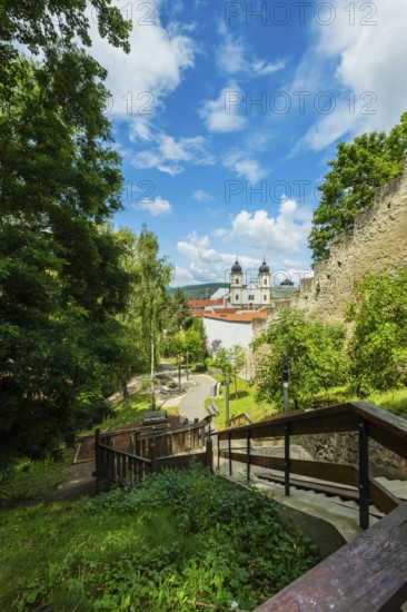Small park with seating, a playground and a fountain at the entrance to Trencin Castle, Capital of Culture 2026, Trencín, Slovakia