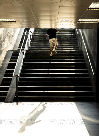 Pedestrians walking up a staircase in the summer heat, Capital of Culture 2026, Trencín, Slovakia