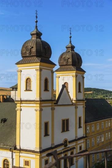 View from the city tower of the Piarist Church of St Francis Xavier and the old town in the evening light, Capital of Culture 2026, Trencín, Slovakia