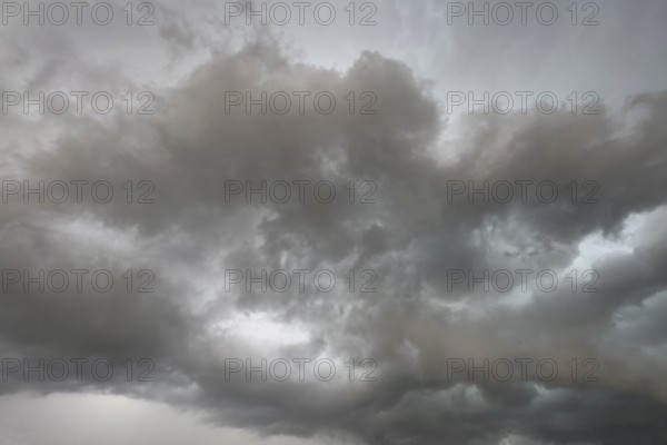 Dark discoloured storm clouds Cloud roll above grey clouds Rain clouds herald thunderstorms, Germany