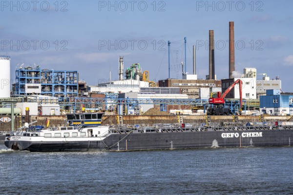Scenery of Chempark Leverkusen, Bayer Leverkusen, chemical park, chemical plant, river Rhine, cargo ship, North Rhine-Westphalia, Germany