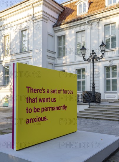 Tony Cokes, visual artist and educator, display panel at the Palais Populaire Unter den Linden, Berlin, Germany