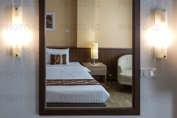 Symbol photo hotel room mirror bed
