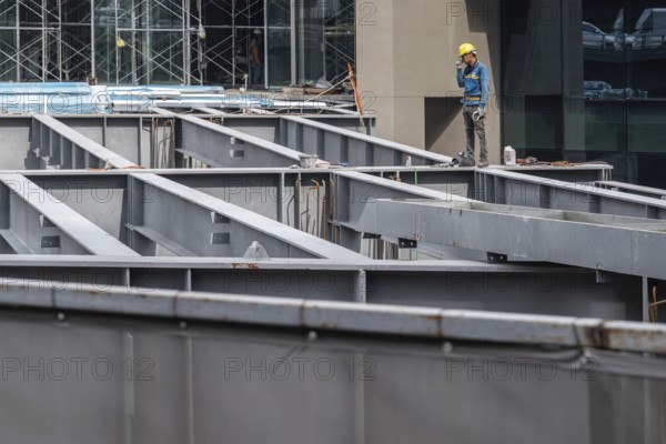 Iron girder construction worker, Bangkok, Thailand