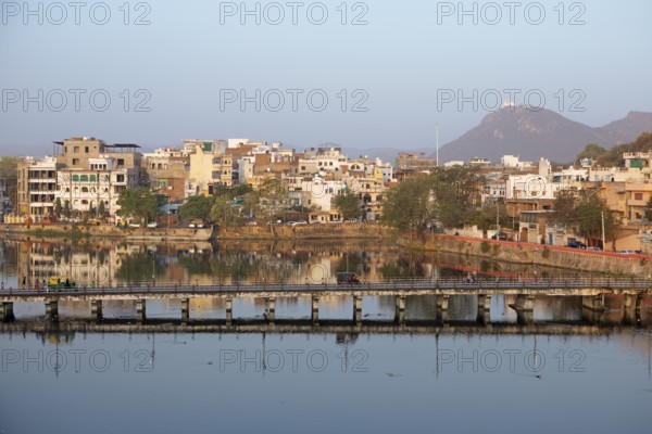 Udaipur and the Swaroop Sagar Lake in the morning light, Rajasthan, India