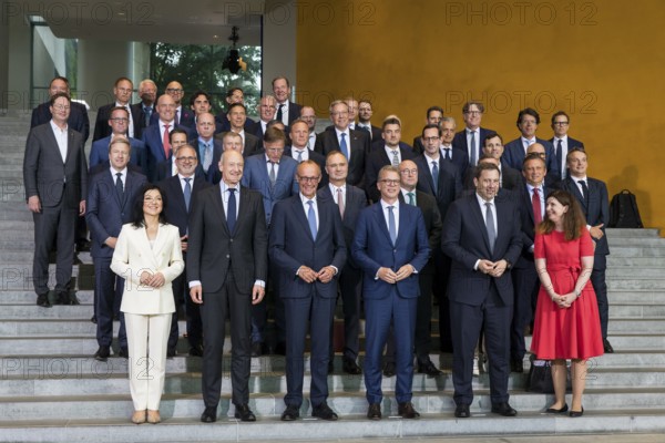 Group photo of the Made for Germany Investment Summit, including in the first row Katherina Reiche (CDU, Federal Minister for Economic Affairs and Energy), Roland bush (CEO of Siemens), Friedrich Merz (CDU, Federal Chancellor), Christian Sewing (CEO of Deutsche Bank), Lars Klingbeil (SPD, Federal Minister of Finance, Vice Chancellor and SPD Federal Chairman) and Bettina Orlopp (CEO of Commerzbank) . The Made for Germany investment summit aims to strengthen Germany as a business location. To this end, representatives from a total of 61 German companies meet with Chancellor Merz in the Federal Chancellery, Berlin, 21 July 2025