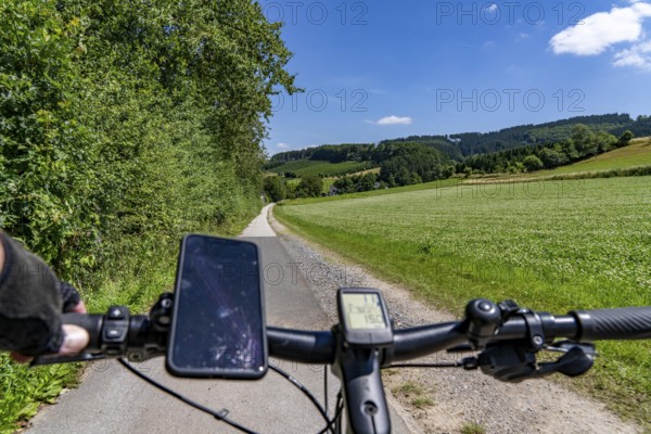 Sauerlandring cycle path, an 84 km long circular cycle path between the towns of Finnentrop, Eslohe, Schmallenberg and Lennestadt, mostly on former railway lines, here near Finnentrop-Serkenrode, Sauerland, North Rhine-Westphalia, Germany