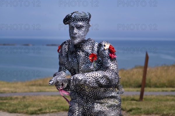 Sculpture by Bill Pendell MM, British World War II veteran, looking back at himself and his comrades in the Battle of Gold Beach, D-Day 75 garden, also Le Jardin du Souvenir, D-Day, Operation Overlord, Mulberry B, Mulberry Harbour, Gold Beach, beach, Port Winston, Arromanches-les-Bains, Normandy, Calvados, France