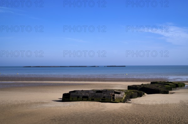 Phoenix Caissons, concrete boxes, caissons, were used in the sea as breakwaters and to form an improvised harbour, Mulberry B Harbour, Mulberry Harbour, Port Winston, Gold Beach, beach, D-Day, Operation Overlord, Arromanches-les-Bains, Normandy, Calvados, France