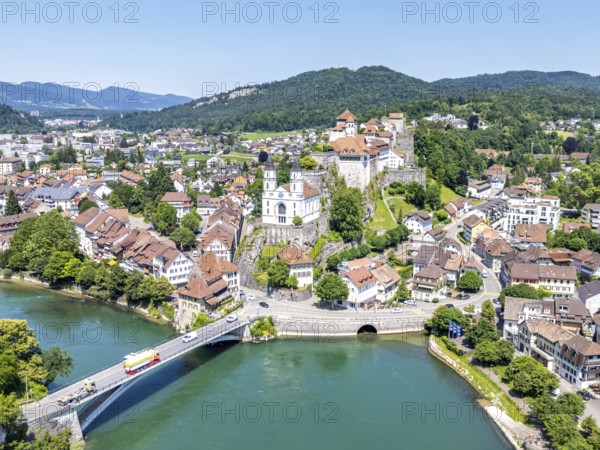 Aarburg town on the river Aare with church and fortress Aerial view from above in Aarburg, Switzerland