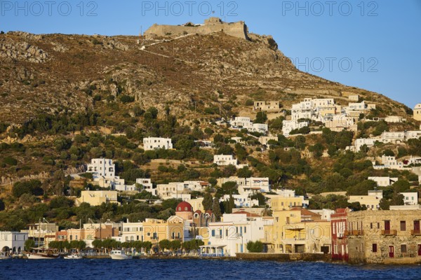 Panteli Fortress, White-blue houses on a hill with an old fortress above, coast in the foreground, Agia Marina, Leros, Dodecanese, Greek Islands, Greece