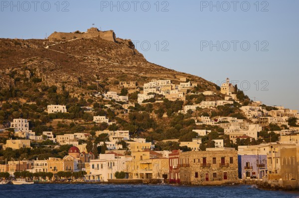 Panteli Fortress, Greek coastal village against a backdrop of hills at sunset, with traditional architecture, Agia Marina, Leros, Dodecanese, Greek Islands, Greece