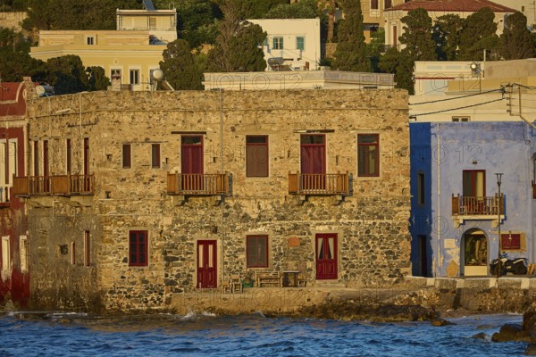 Old stone house by the sea under a blue sky with traditional Greek architecture, Agia Marina, Leros, Dodecanese, Greek Islands, Greece