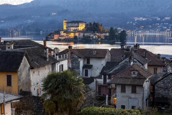 Old town with view of Isola San Giulio, Orta San Giulio, on Lake Orta, Province of Novara, Piedmont, Lago d'Orta, Italy