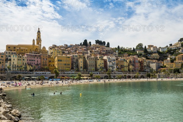 Town with colourful houses by the sea, Plage des Sablettes, Menton, Alpes Maritimes, Provence Alpes Cote d'Azur, French Riviera, South of France, France