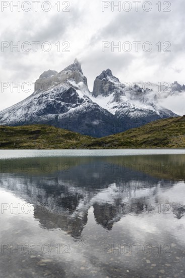Cuernos del Paine mountain range, reflection in Lago Nordenskjöld, Torres del Paine National Park, Chile