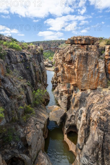 Bridges over a canyon with steep orange-coloured cliffs and the Blyde River, Bourke's Luck Potholes, Panorama Route, Mpumalanga, South Africa