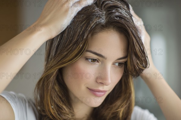Beautiful Beautiful woman applying hair color to her hair in hairdressing salon, AI generated