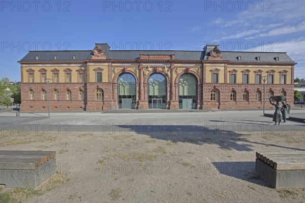 Old Post Office built in 1893 and sculpture of a woman wearing shoes, monument to the former shoe industry, Neo-Renaissance, Joseph-Krekeler-Platz, Pirmasens, Rhineland-Palatinate, Germany