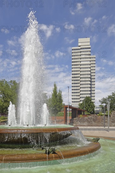 Round torch fountain by Friedrich Korter 1939 and town hall, water fountain with water basin, water features, bowl fountain, modern tower block, Kaiserslautern, Rhineland-Palatinate, Germany