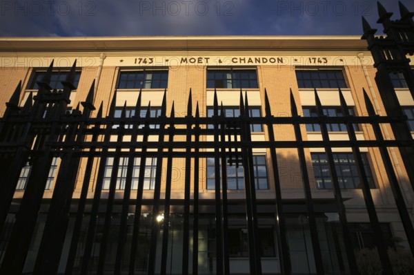 Fence in front of company headquarters, headquarters of the champagne brand Moët & Chandon, part of the luxury goods group LVMH Louis Vuitton Moët Hennessy, Avenue de Champagne, Épernay, Marne, France