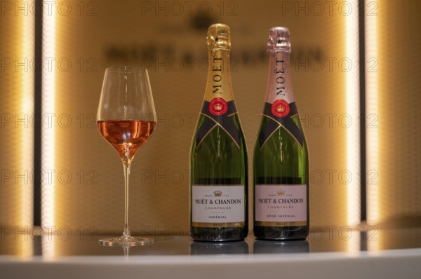 Bottle of Champagne Rosé and Impérial Brut, filled glass, logo, lettering, headquarters of the champagne brand Moët & Chandon, part of the luxury goods group LVMH Louis Vuitton Moët Hennessy, Avenue de Champagne, Épernay, Marne, France