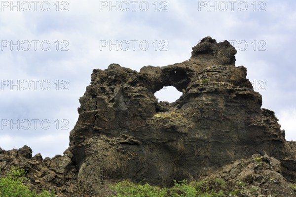 Dimmuborgir, bizarrely shaped rock formation, rock arch in the lava field, Krafla volcano system, Dimmuborgir National Park, Mývatn, Iceland