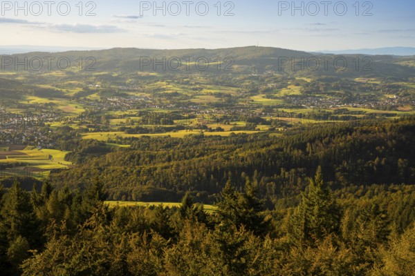 View of the Odenwald from the drum tower in Rimbach. Towns, forest, meadows, fields. Sunset. Rimbach, Bergstrasse district, Odenwald, Hesse, Germany