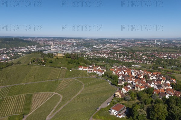 City with surrounding vineyards and landscape under a clear sky, view of Rotenberg near Stuttgart with burial chapel, in the background the Mercedes-Benz plant in Stuttgart-Untertürkheim and the MHP Arena, Baden-Württemberg, Germany