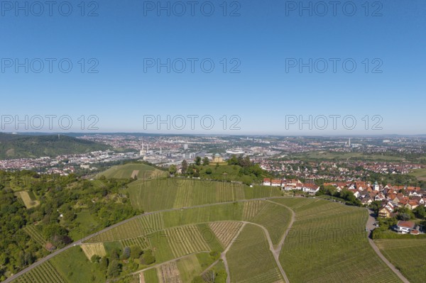 Landscape with vineyards and city with clear sky and wide view, view of Rotenberg near Stuttgart with burial chapel, in the background the Mercedes-Benz plant in Stuttgart-Untertürkheim and the MHP Arena, Baden-Württemberg, Germany
