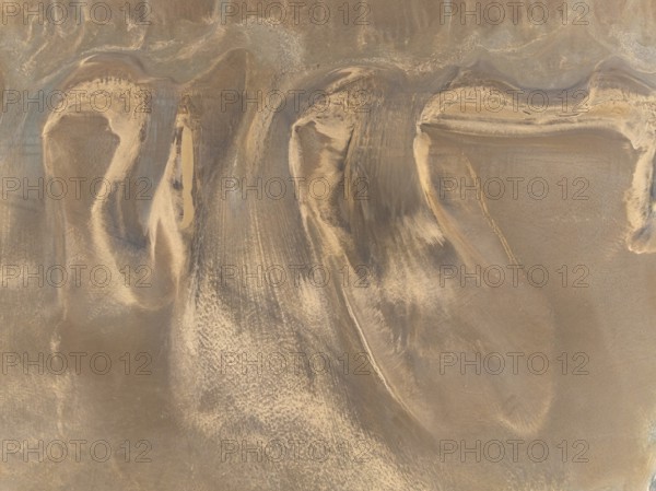 Low tide patterns in the ground of the Walvis Bay Lagoon. Aerial view. Drone shot. Namibia