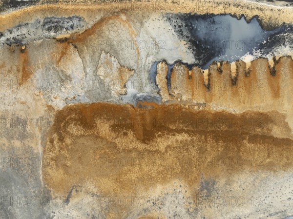 Abstract saline patterns at the edge of the Walvis Bay salt works. Aerial view. Drone shot. Namibia