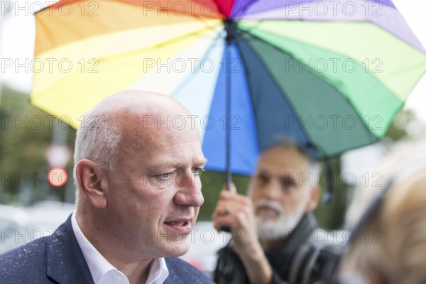 Kai Wegner (Governing Mayor of Berlin) gives interviews after raising the rainbow flag for Pride Week in front of the Rotes Rathaus in Berlin on 9 July 2025