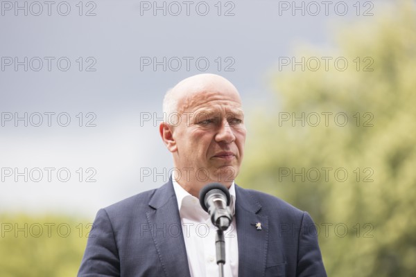 Kai Wegner (Governing Mayor of Berlin) gives a speech in front of the raising of the rainbow flag for Pride Week in front of the Rotes Rathaus in Berlin on 9 July 2025